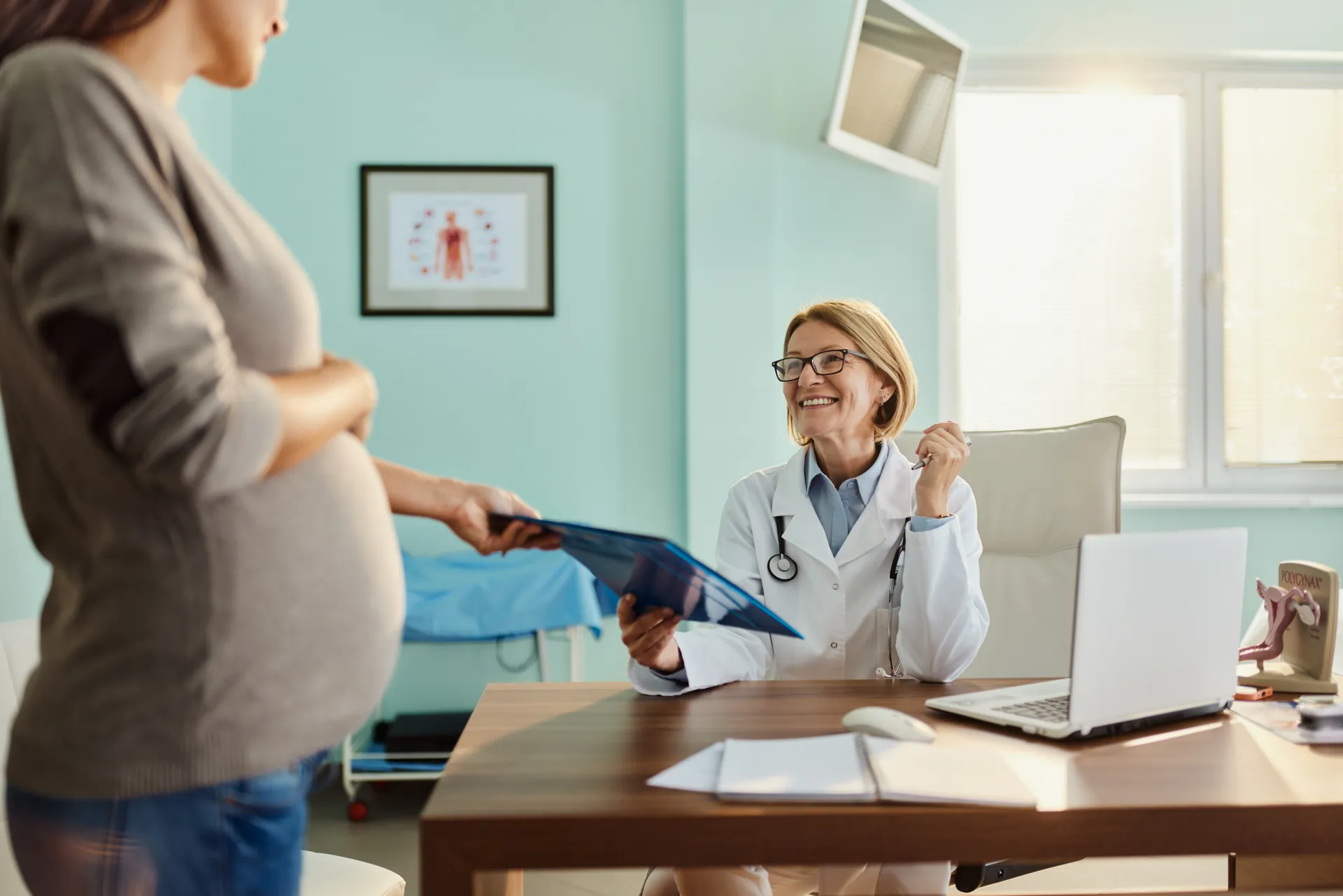 A specialist walking a patient through her options