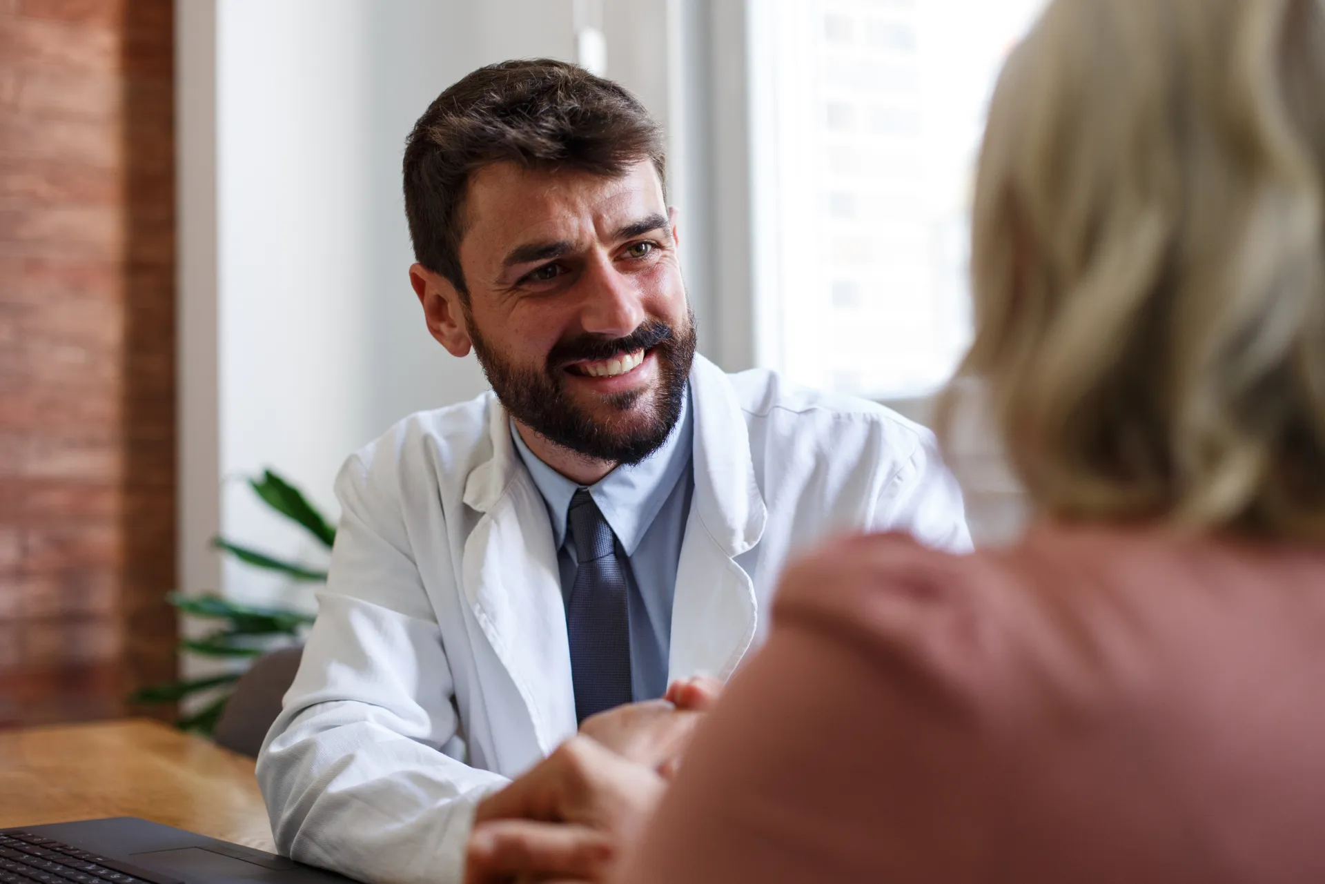 A business owner reviewing his numbers with a consultant